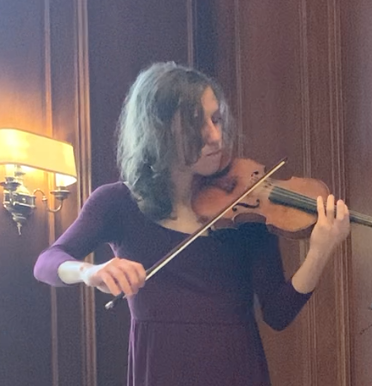 Myself playing violin at a recent recital